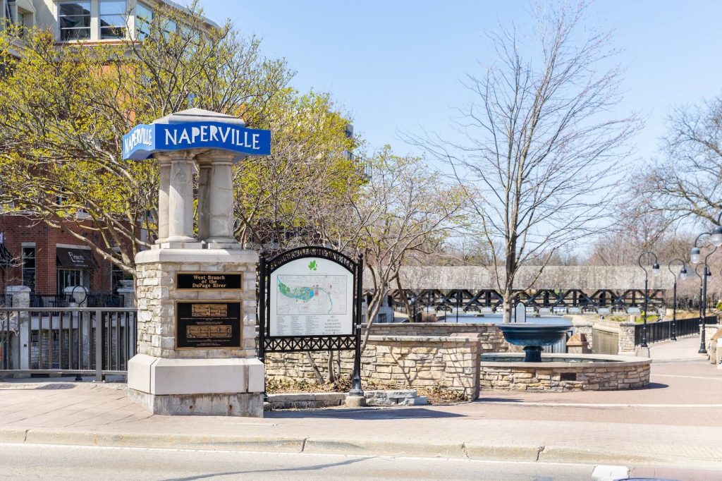 Naperville downtown square with waterfront view behind it